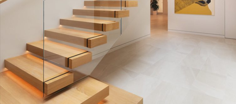 Cantilever floating stair with glass railings