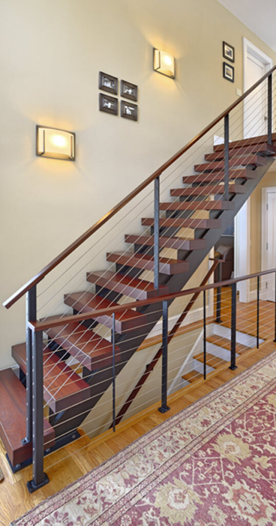 Double rectangular stair stringers with formal aesthetic.