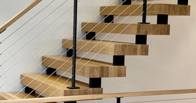 Double stringer stair with wood treads and cable railing