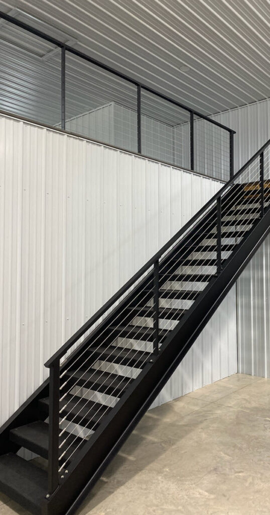 C-channel stair with two stringers and steel treads. 