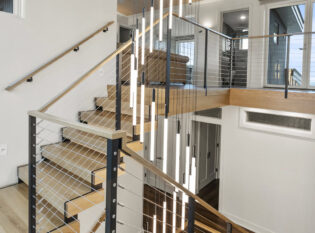 Sleek stair and cable railing system