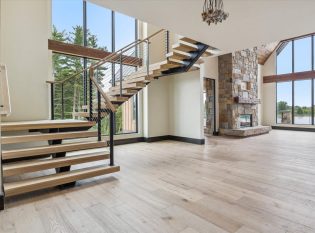 Great room floating stairs and cable railing