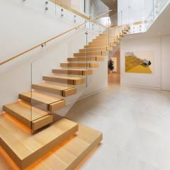 cantilevered-stair-glass-railing-keuka-studios